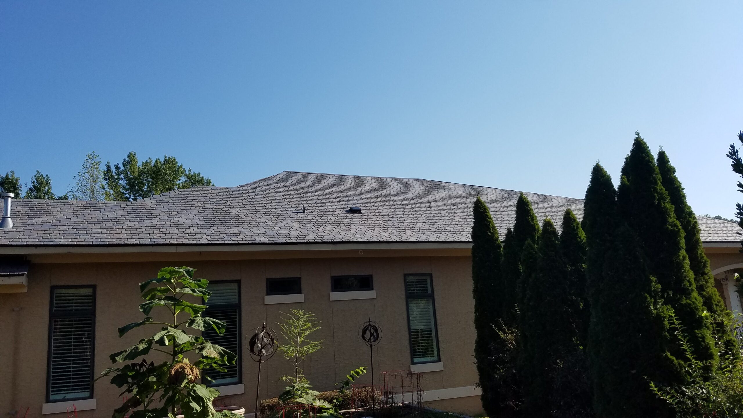 Roofing crew working on a roof
