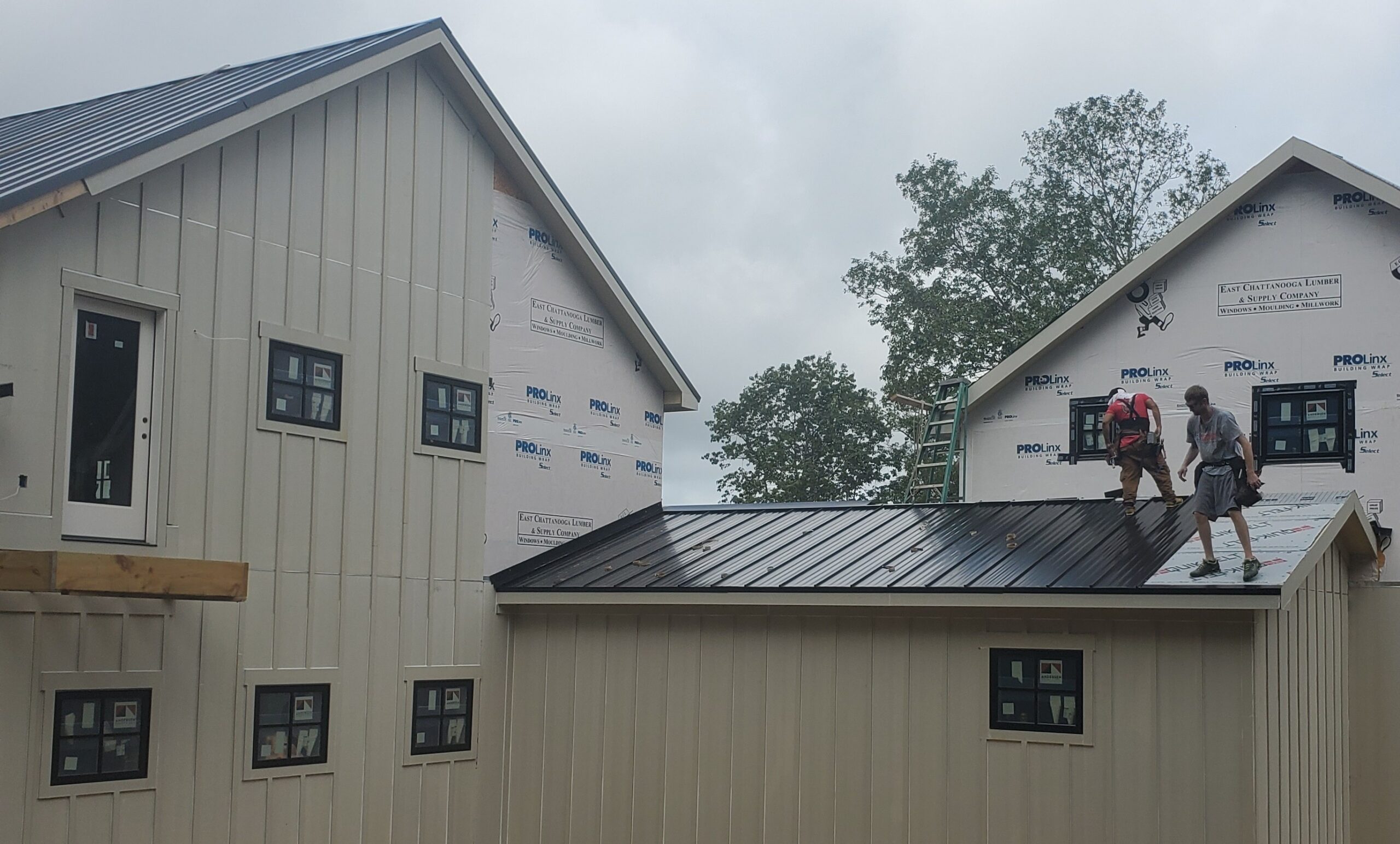 Metal roofing installation on a residential property